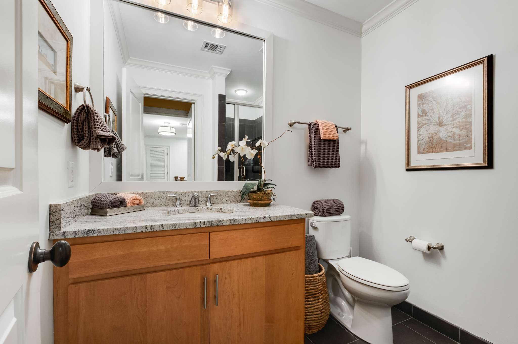 4401 Ridgefield Way Nashville, TN 37205 - Photo 35 of 46 a bathroom with a granite countertop toilet sink and mirror