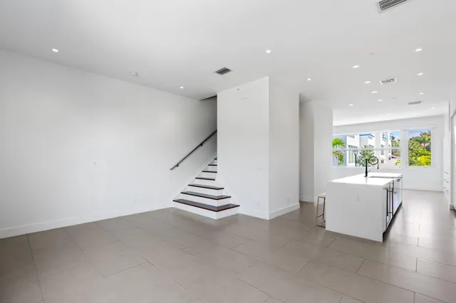 a view of entryway with kitchen