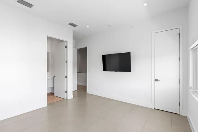 a view of a livingroom with a flat screen tv