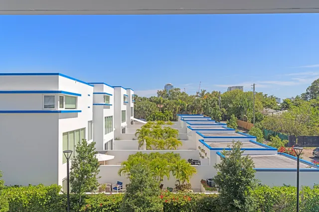 a view of a city with tall buildings