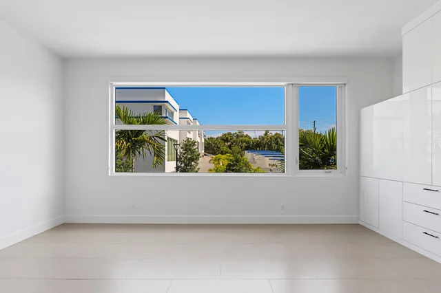 a view of a room with a window