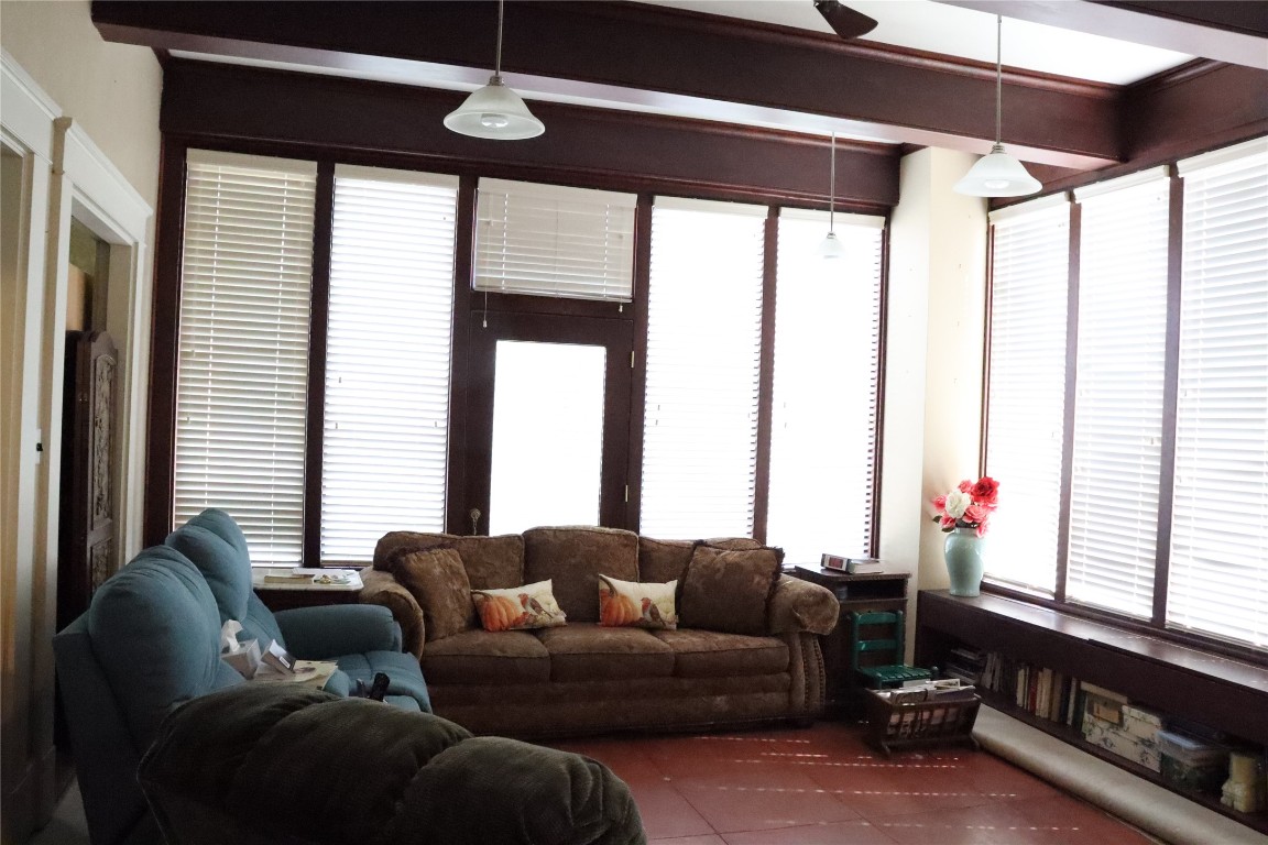 701 Sloan Street Taylor, TX 76574 - Photo 29 of 32 a living room with furniture and a window