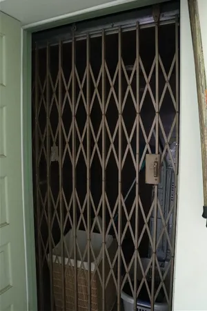 a room with a window and storage space