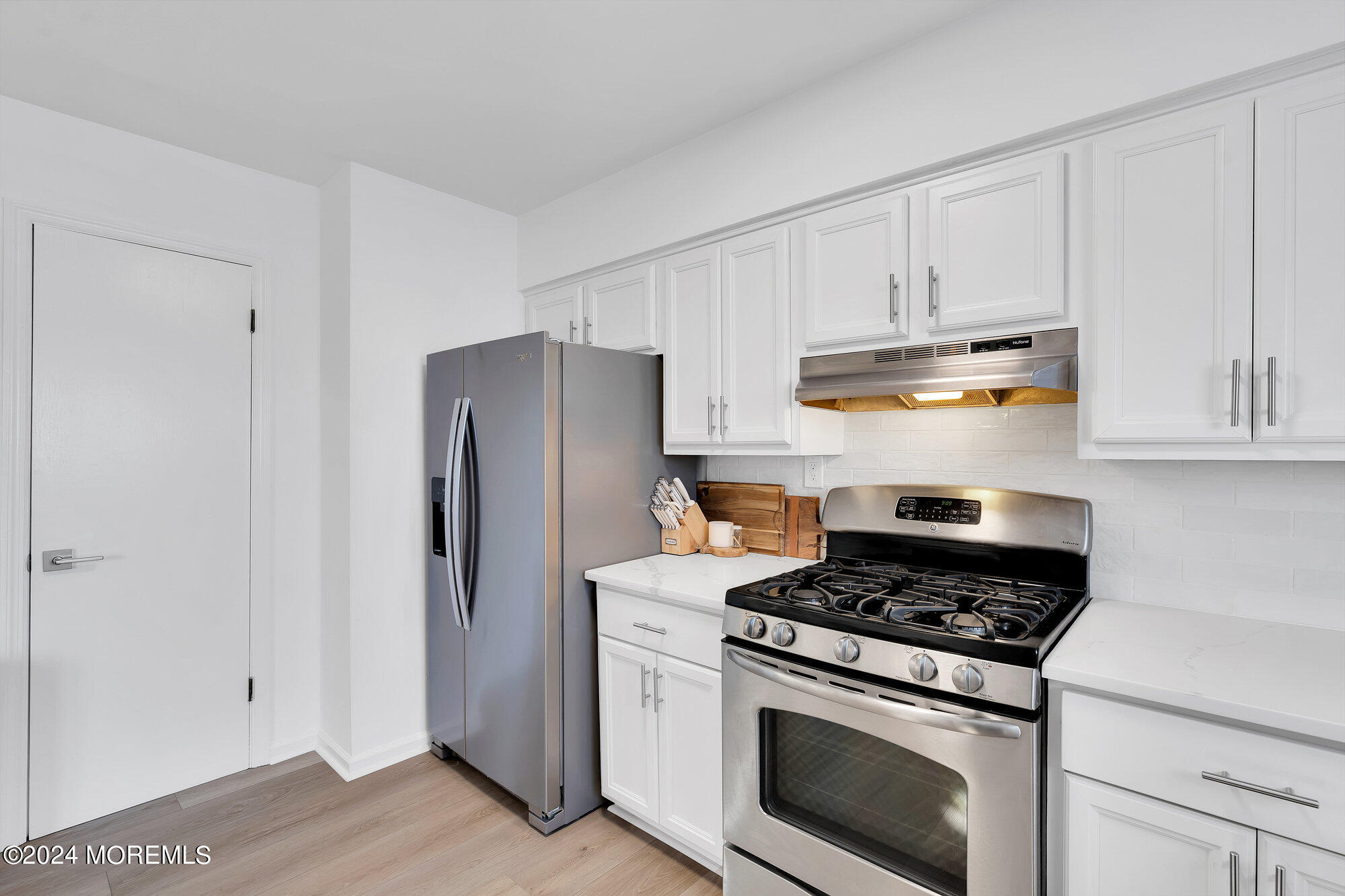 22 Devon Court Spring Lake Heights, NJ 07762 - Photo 16 of 54 a kitchen with cabinets and steel stainless steel appliances