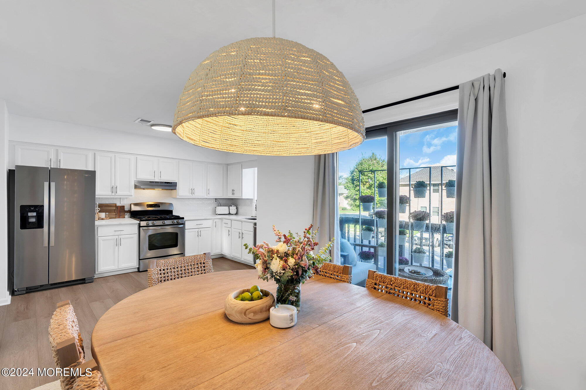 22 Devon Court Spring Lake Heights, NJ 07762 - Photo 19 of 54 a kitchen with stainless steel appliances granite countertop a sink window and cabinets