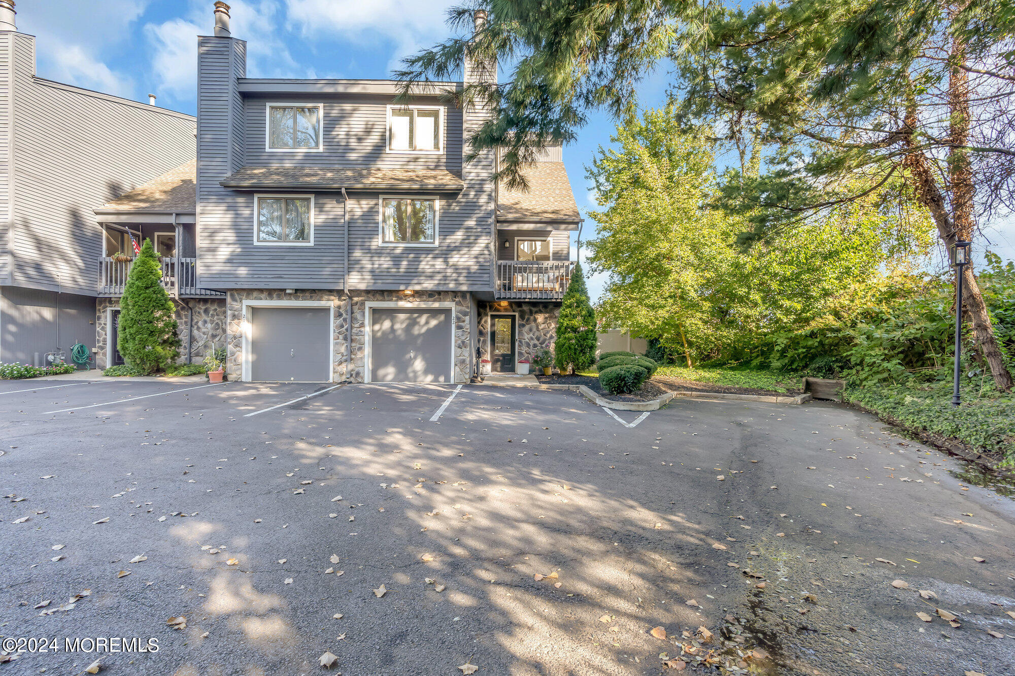 22 Devon Court Spring Lake Heights, NJ 07762 - Photo 2 of 54 a view of a street with a building in the background