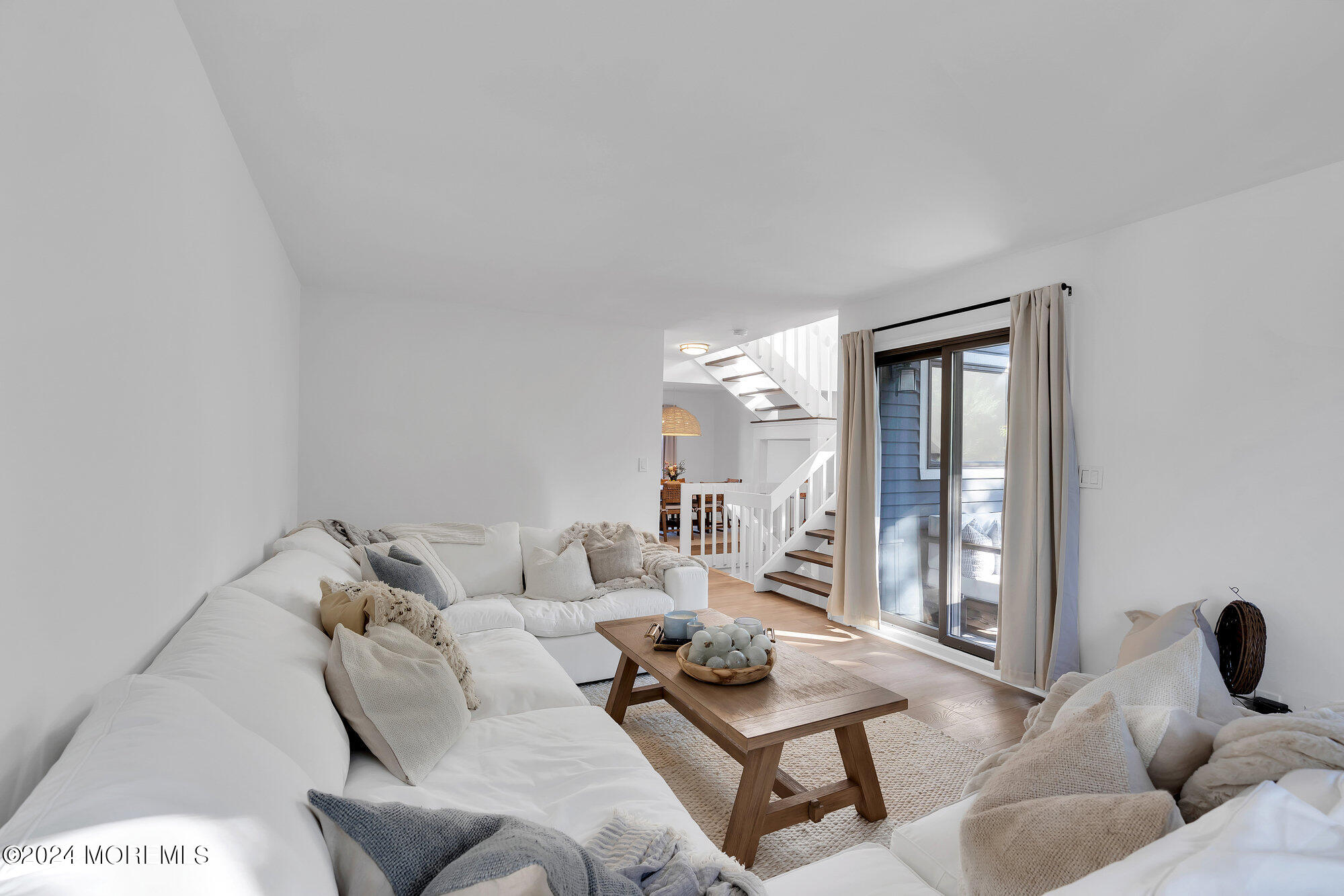 22 Devon Court Spring Lake Heights, NJ 07762 - Photo 32 of 54 a living room with furniture and a potted plant