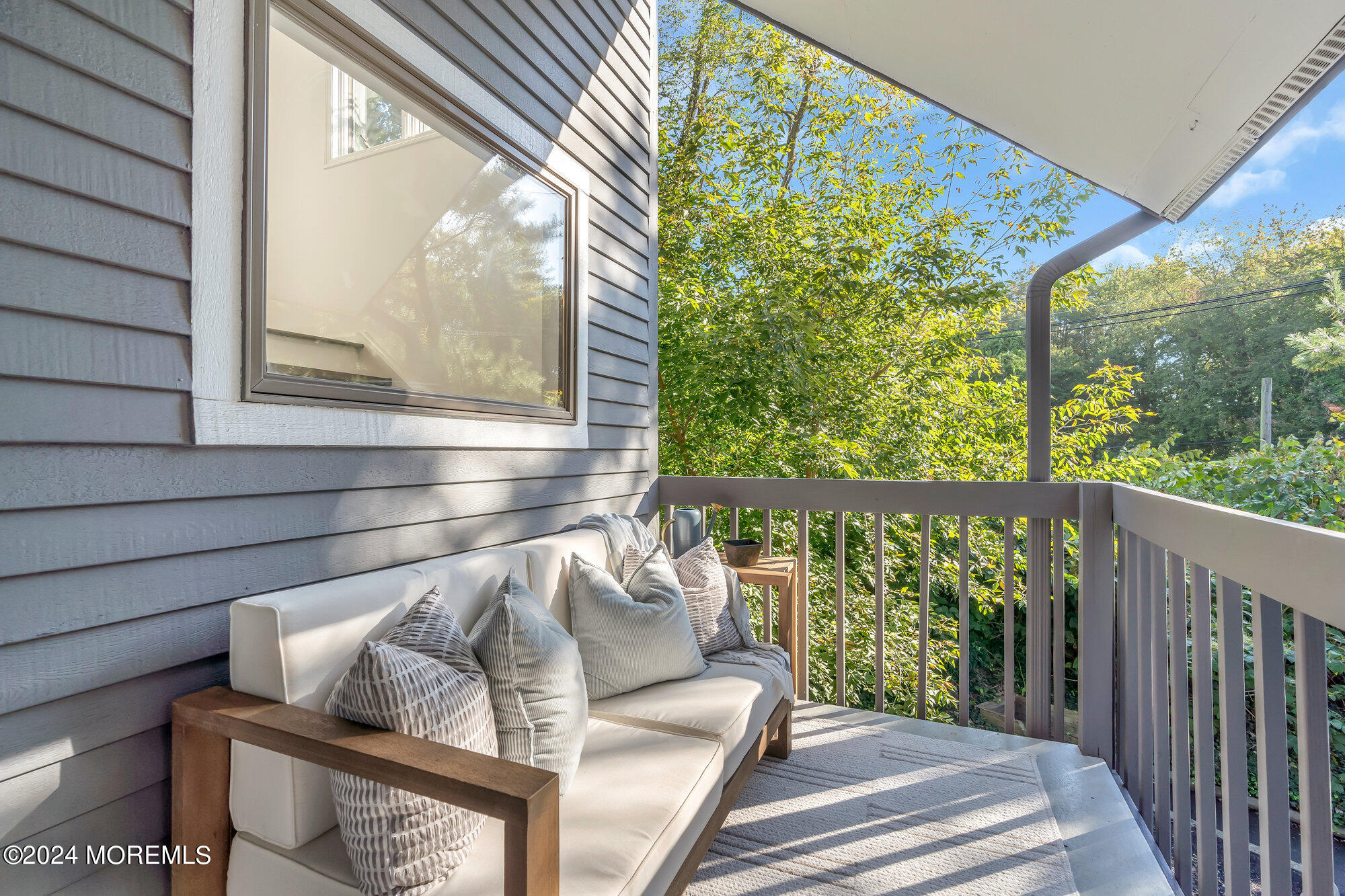 22 Devon Court Spring Lake Heights, NJ 07762 - Photo 33 of 54 a view of a porch with furniture