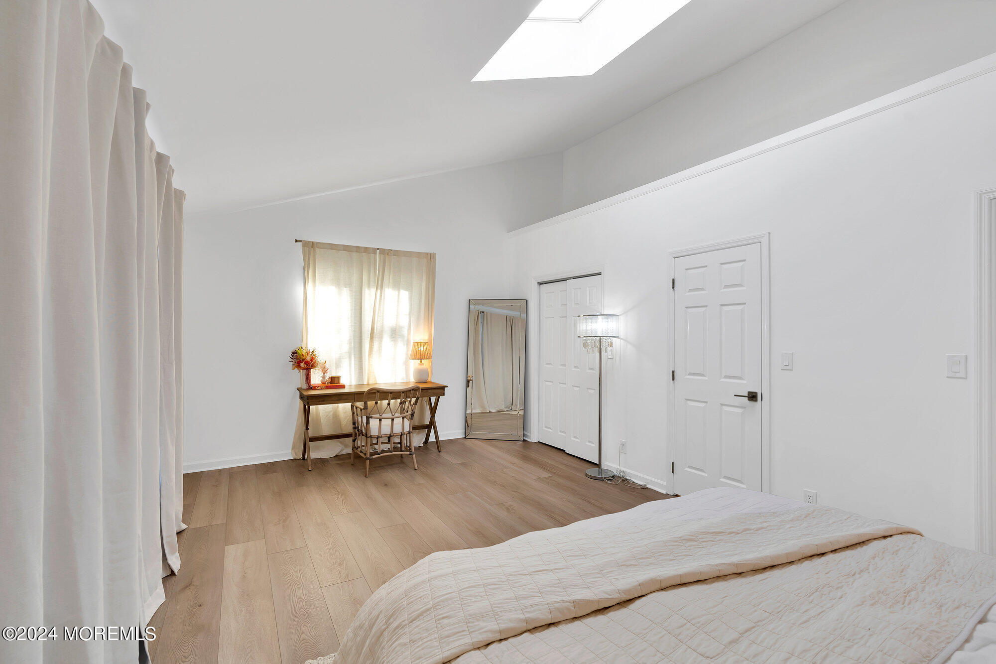 22 Devon Court Spring Lake Heights, NJ 07762 - Photo 46 of 54 a bedroom with a bed and a window