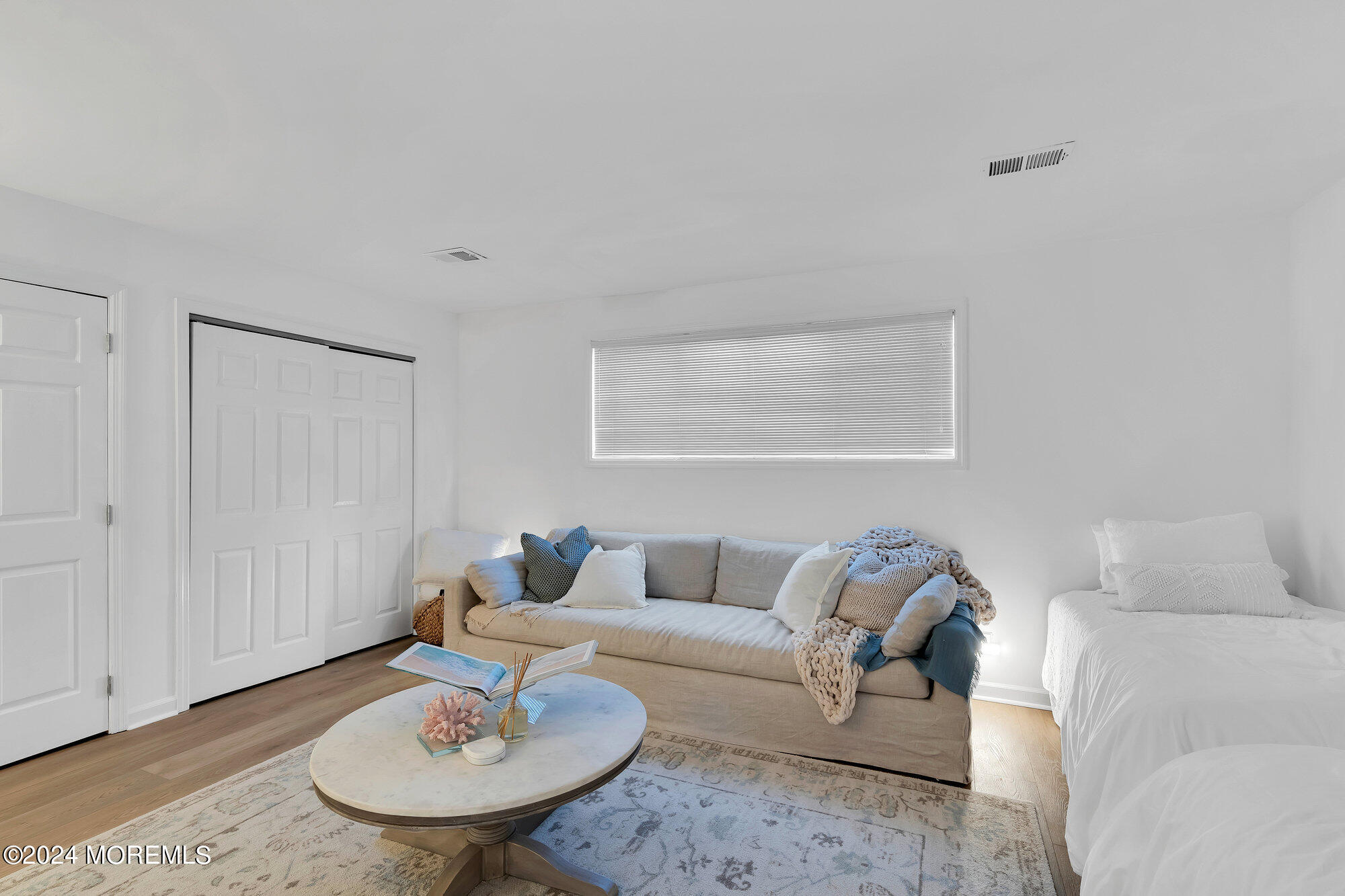 22 Devon Court Spring Lake Heights, NJ 07762 - Photo 7 of 54 a living room with furniture and a table