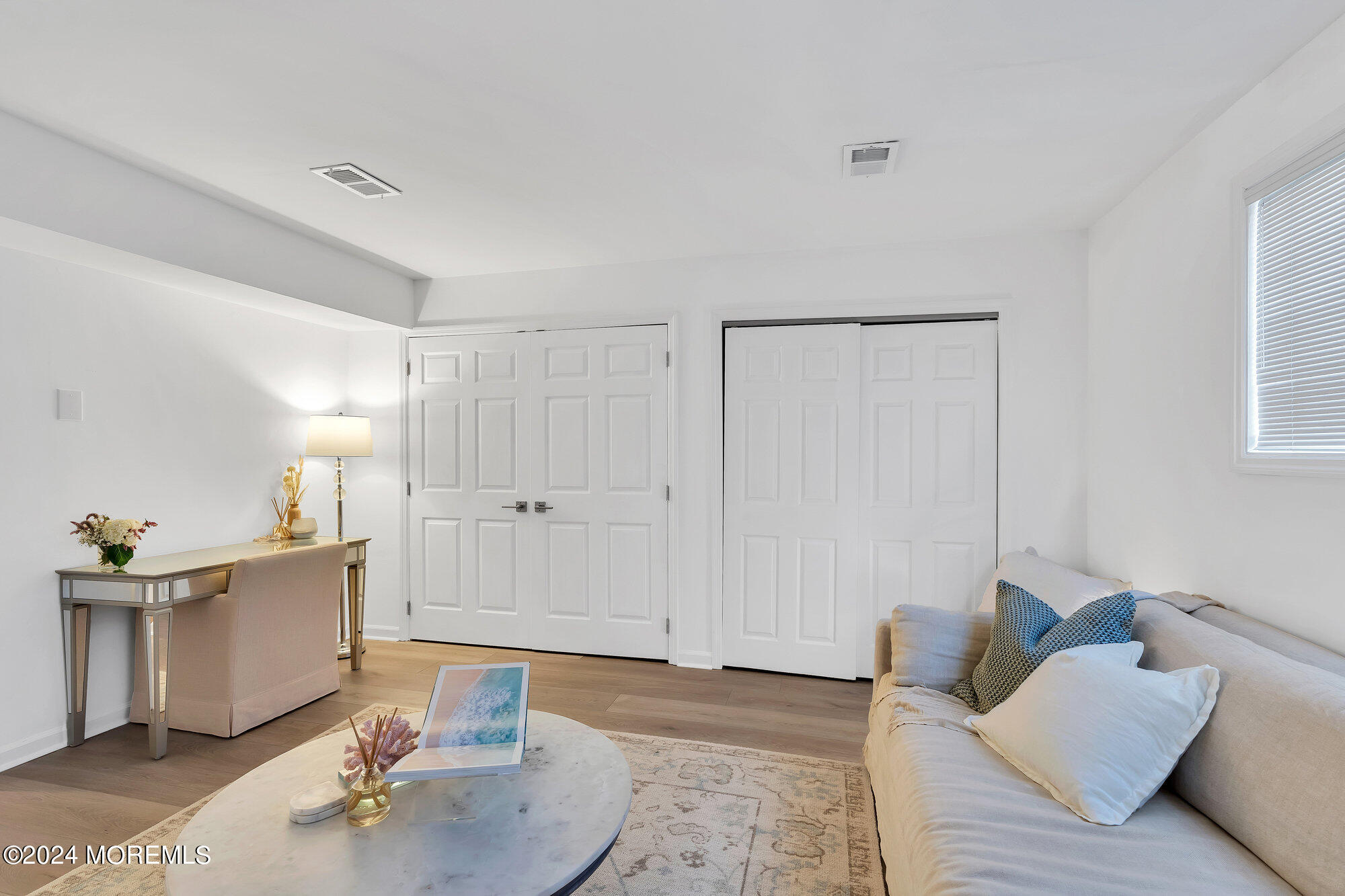 22 Devon Court Spring Lake Heights, NJ 07762 - Photo 8 of 54 a living room with furniture and a wooden floor