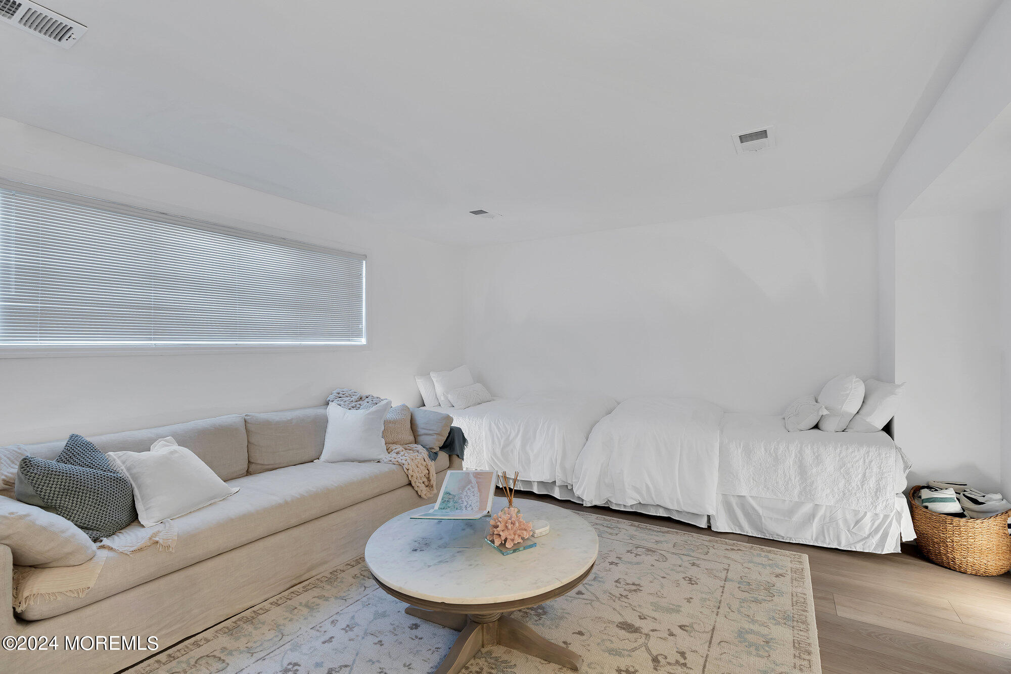 22 Devon Court Spring Lake Heights, NJ 07762 - Photo 10 of 54 a living room with furniture and a table