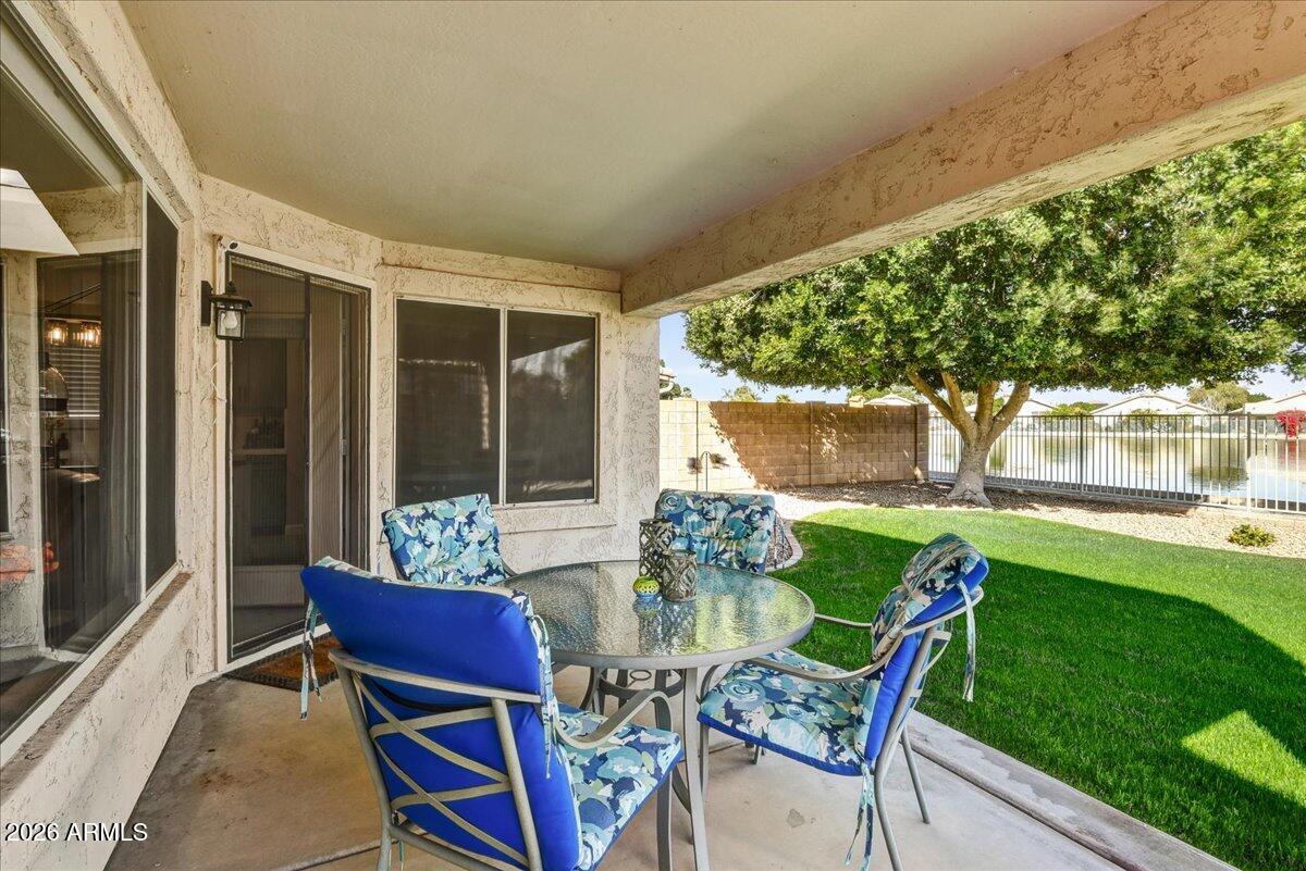 10830 West Almeria Road Avondale, AZ 85392 - Photo 20 of 27 a view of an outdoor dining space with a table and chairs