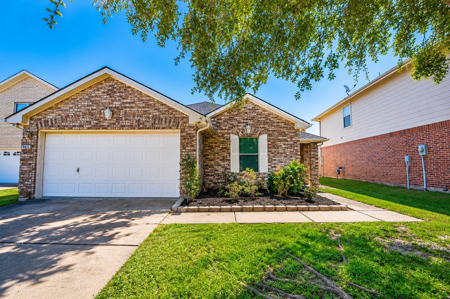 9611 Prairie Dog Run Sugar Land, TX 77498 - Photo 1 of 12 a view of a house with backyard and garden
