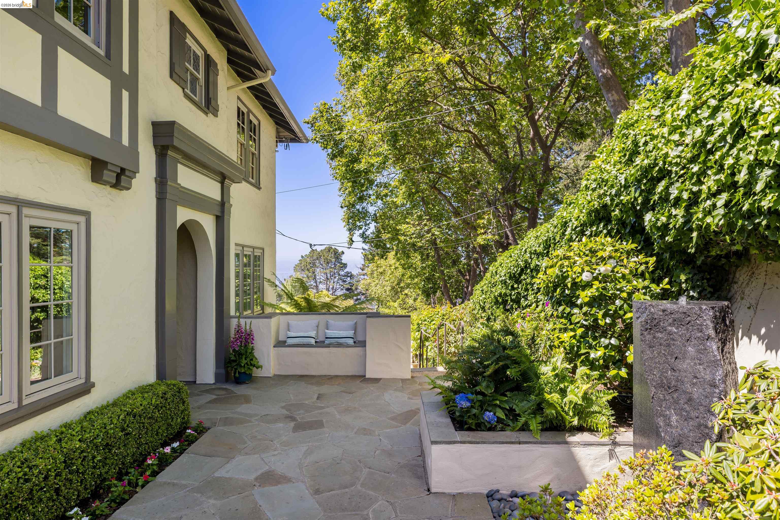 900 Euclid Avenue Berkeley, CA 94708 - Photo 3 of 54 a front view of a house with a garden
