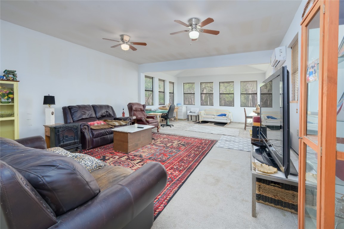 368 Lytton Lane Dale, TX 78616 - Photo 12 of 29 a living room with furniture fireplace and a large window