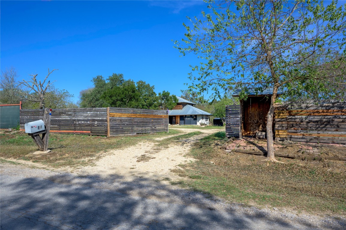 368 Lytton Lane Dale, TX 78616 - Photo 25 of 29 a backyard of a house with table and chairs