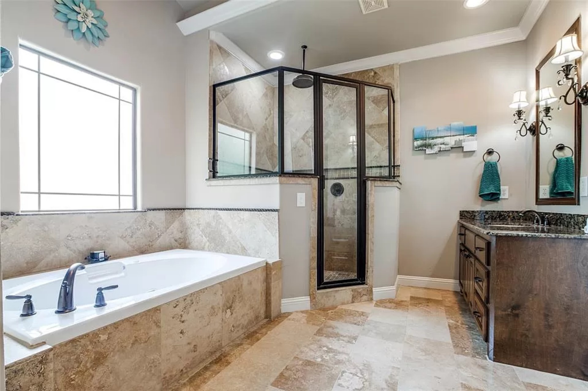 185 Capetown Conroe, TX 77356 - Photo 4 of 25 a bathroom with a tub a sink and a mirror