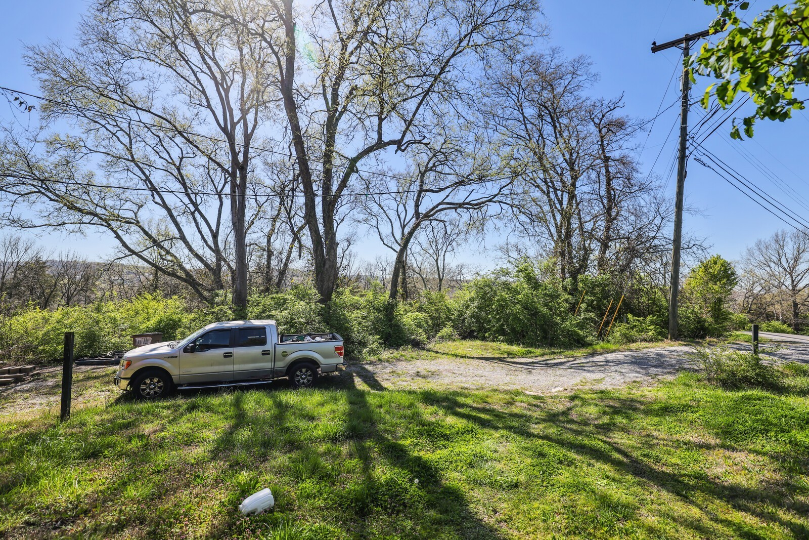 5052 Mt View Road Antioch, TN 37013 - Photo 17 of 39 a view of a backyard with a car parked on the road