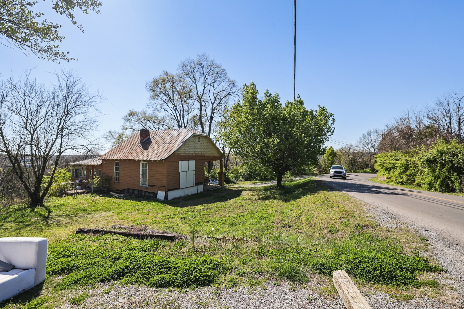 5052 Mt View Road Antioch, TN 37013 - Photo 19 of 39 a view of a house with a big yard and large trees