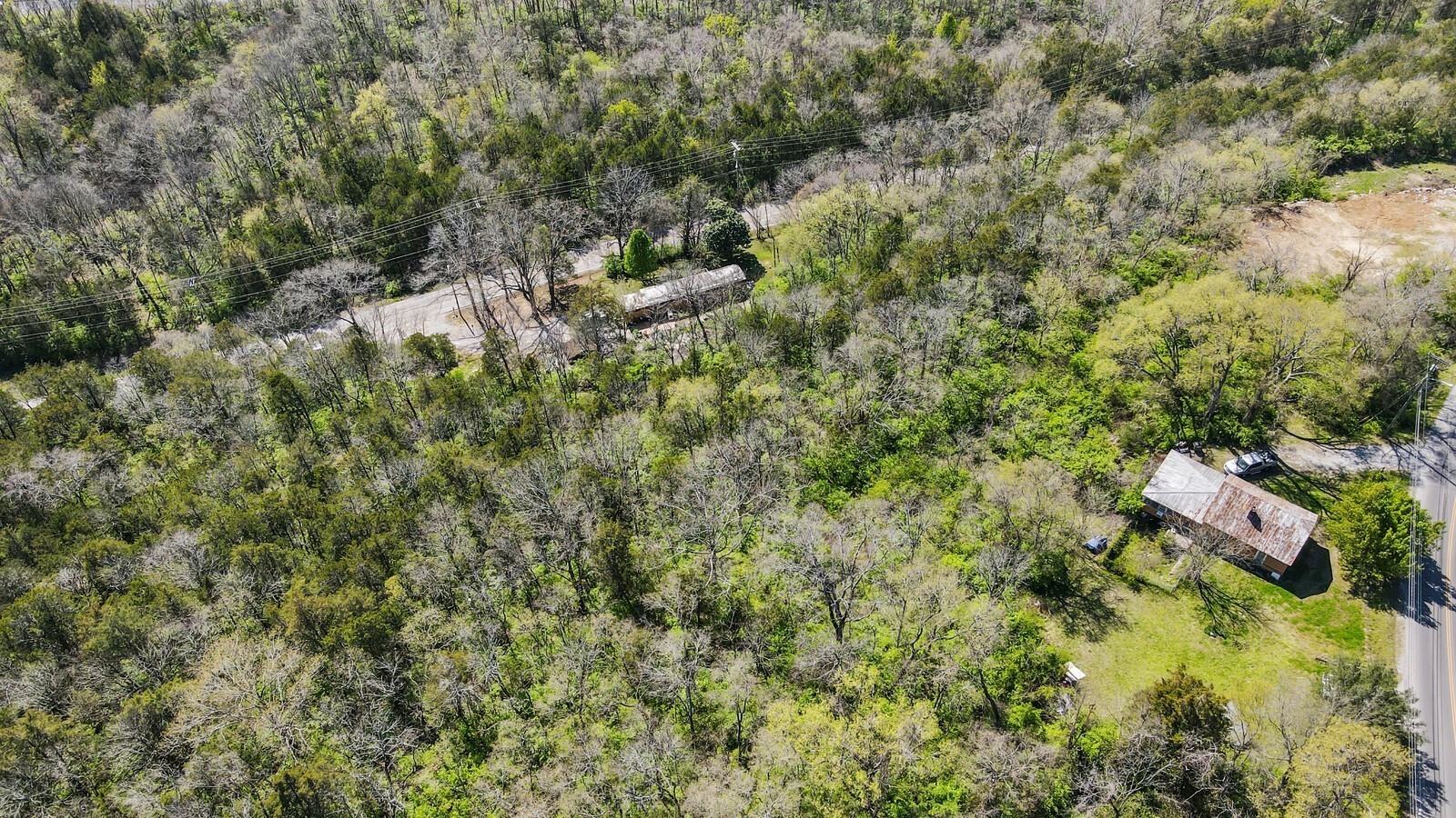 5052 Mt View Road Antioch, TN 37013 - Photo 35 of 39 a view of a house with a yard and large trees