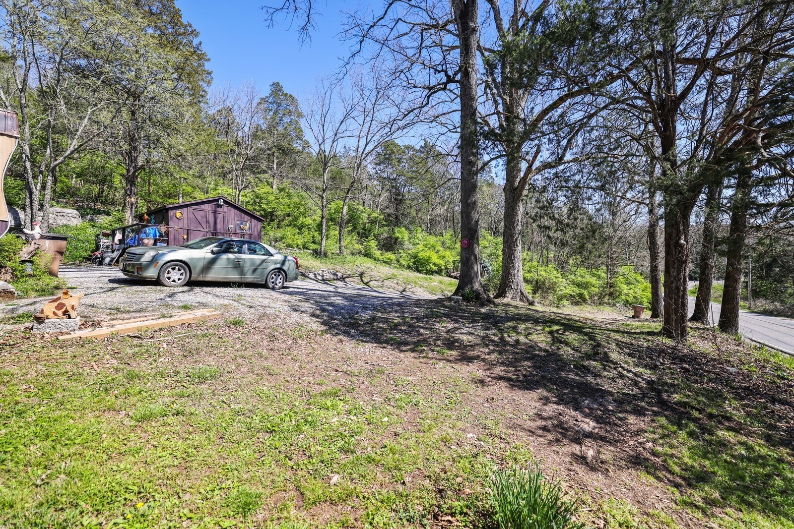 5052 Mt View Road Antioch, TN 37013 - Photo 9 of 39 a car parked in front of a road with trees
