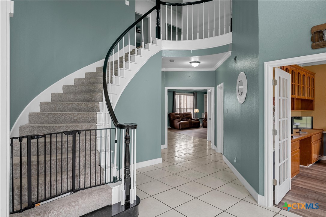 3891 Highway 53 Temple, TX 76501 - Photo 5 of 45 Staircase in foyer