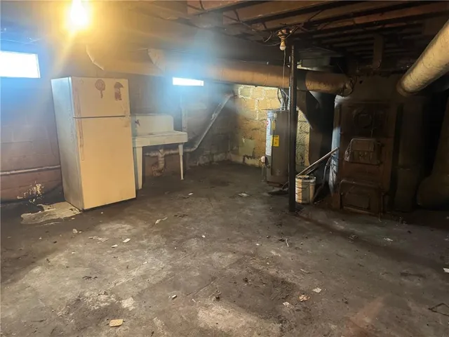 a view of a garage with refrigerator