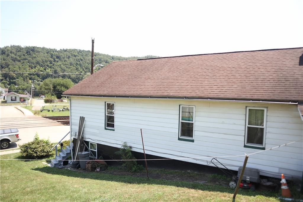 601 Main Street Merrittstown, PA 15463 - Photo 7 of 18 a front view of a house with a yard