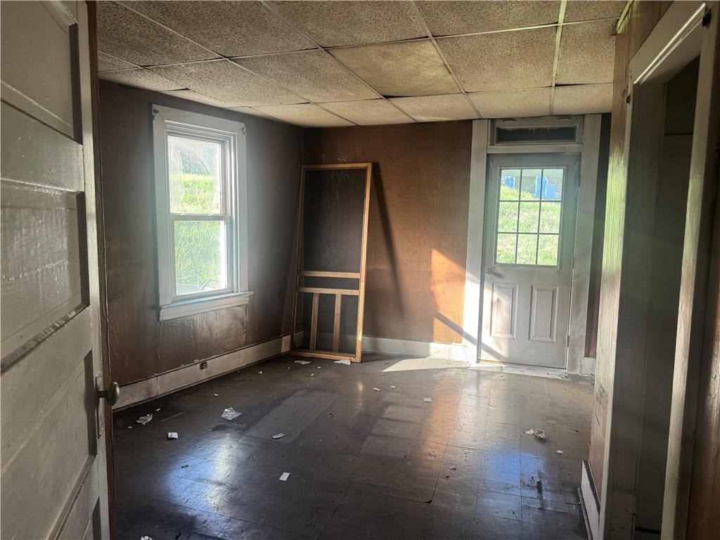 601 Main Street Merrittstown, PA 15463 - Photo 9 of 18 an empty room with wooden floor and windows