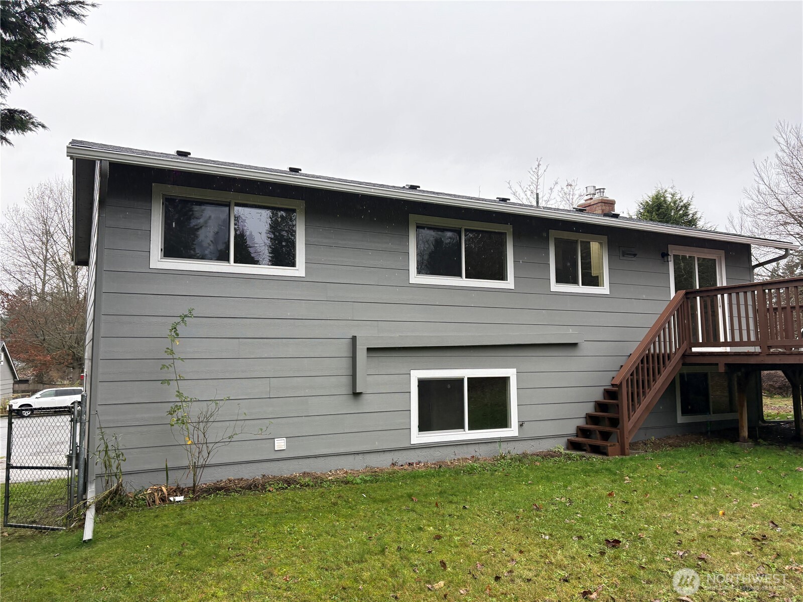 16312 127th Place Southeast Renton, WA 98058 - Photo 2 of 25 a view of a house with a balcony