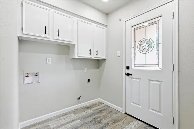 a view of cabinets and window