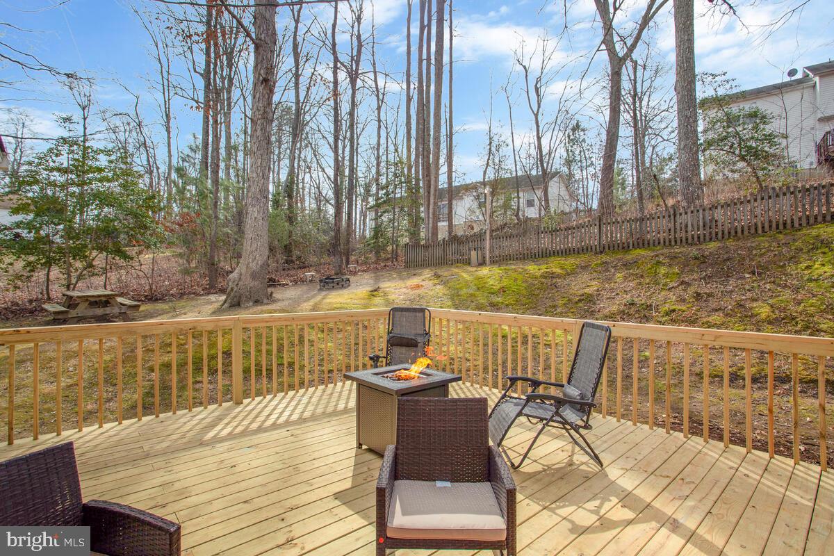 391 Red Cloud Road Lusby, MD 20657 - Photo 2 of 39 Huge deck for entertaining.