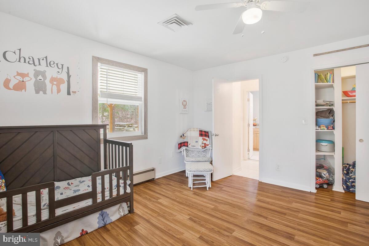 391 Red Cloud Road Lusby, MD 20657 - Photo 26 of 39 Nice sized 2nd bedroom with lots of natural light.