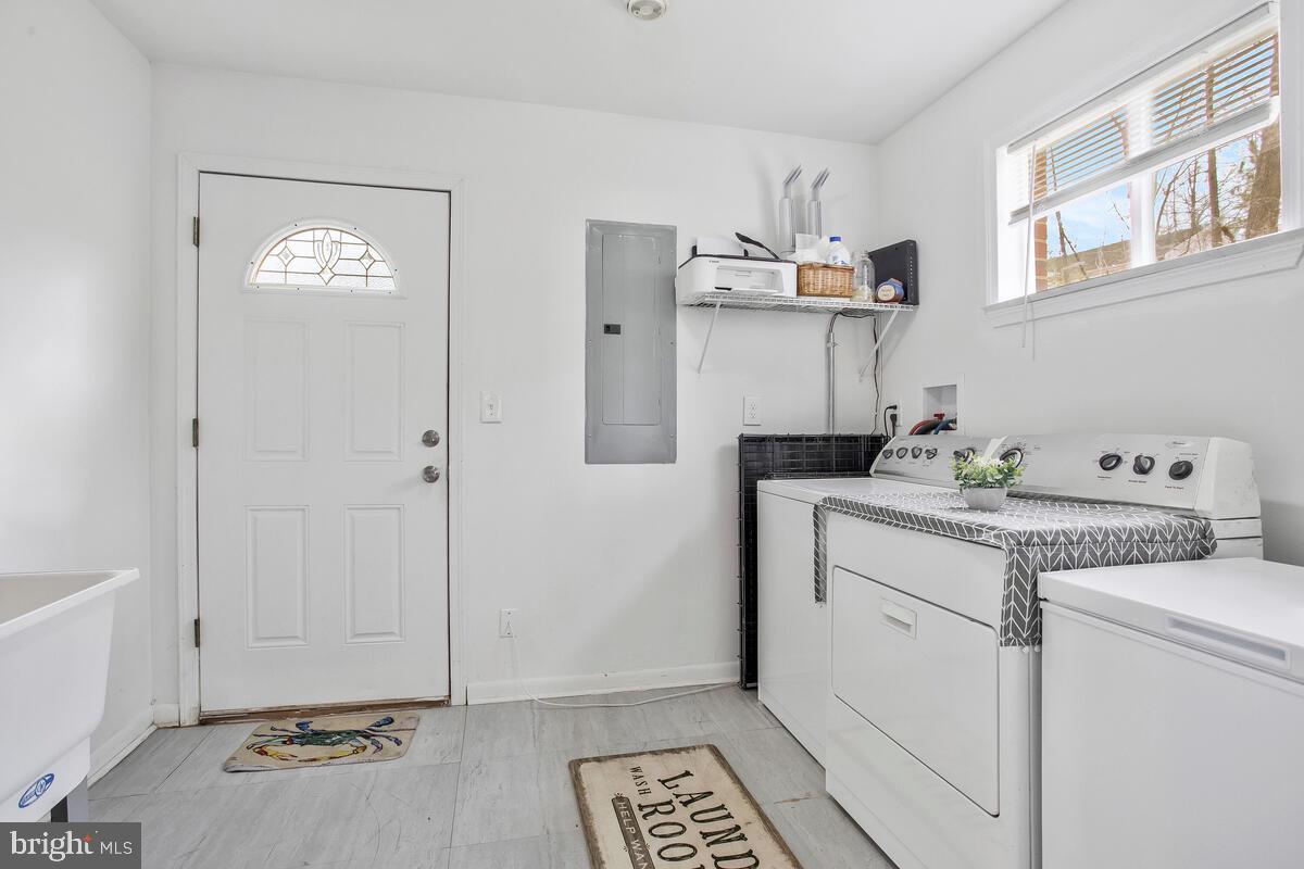 391 Red Cloud Road Lusby, MD 20657 - Photo 31 of 39 What about this! Large laundry area w/laundry TUB