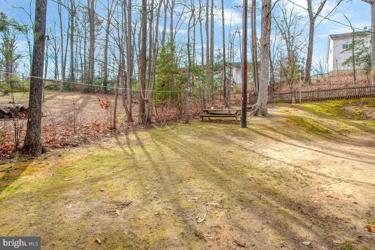391 Red Cloud Road Lusby, MD 20657 - Photo 34 of 39 Back yard view.