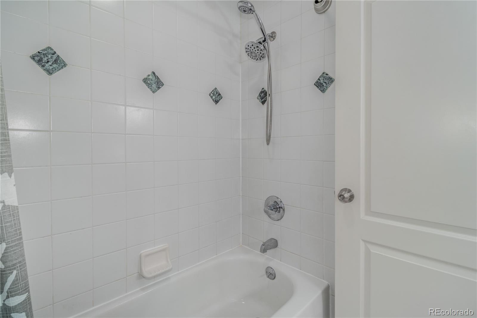 3940 Montclair Lane Boulder, CO 80301 - Photo 16 of 26 a bathroom with a bathtub