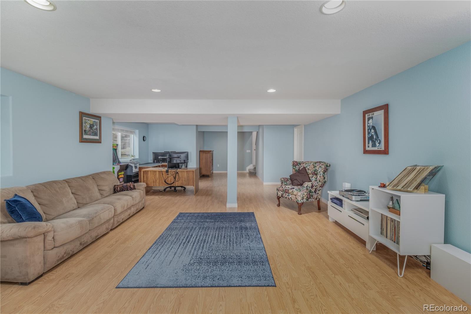 3940 Montclair Lane Boulder, CO 80301 - Photo 22 of 26 a living room with furniture and a couch
