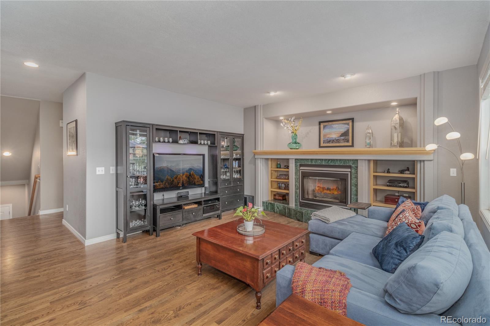3940 Montclair Lane Boulder, CO 80301 - Photo 3 of 26 a living room with furniture and a fireplace