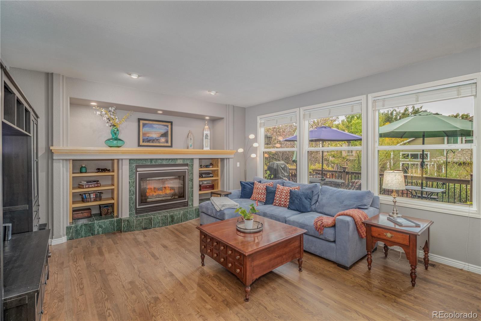 3940 Montclair Lane Boulder, CO 80301 - Photo 4 of 26 a living room with furniture and a fireplace