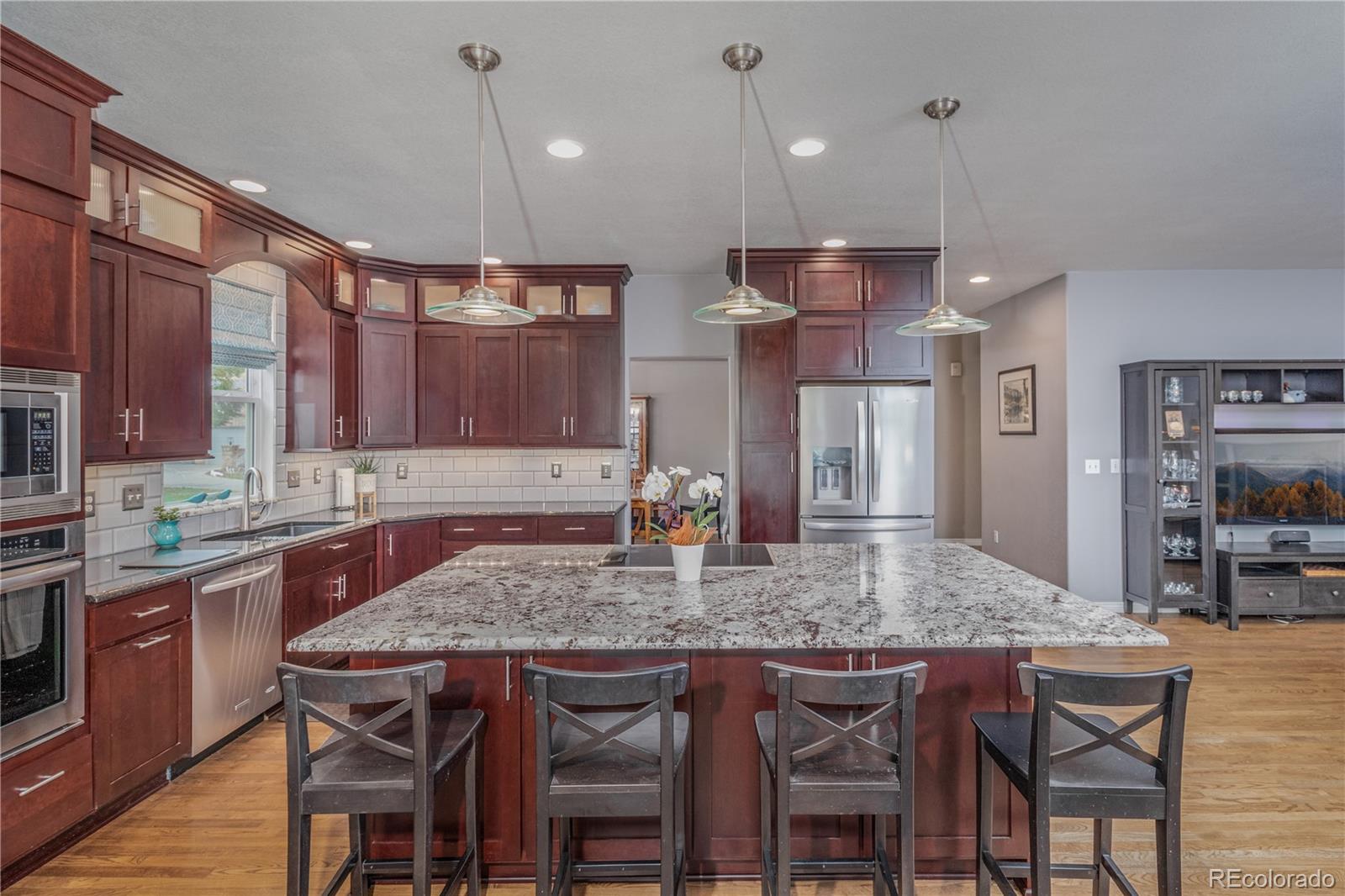 3940 Montclair Lane Boulder, CO 80301 - Photo 8 of 26 a kitchen with a table and chairs in it