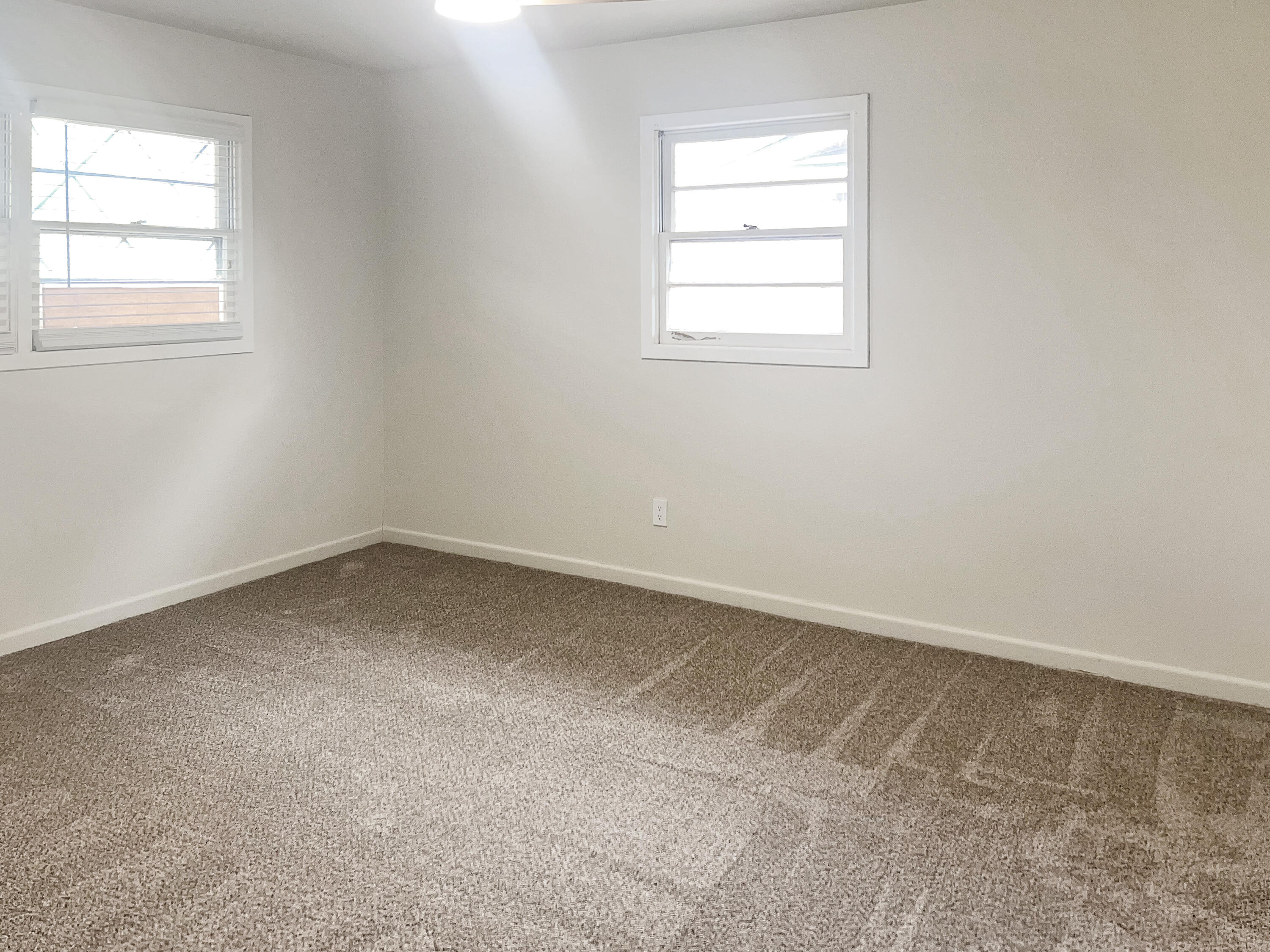3827 52nd Street Lubbock, TX 79413 - Photo 16 of 24 an empty room with a window