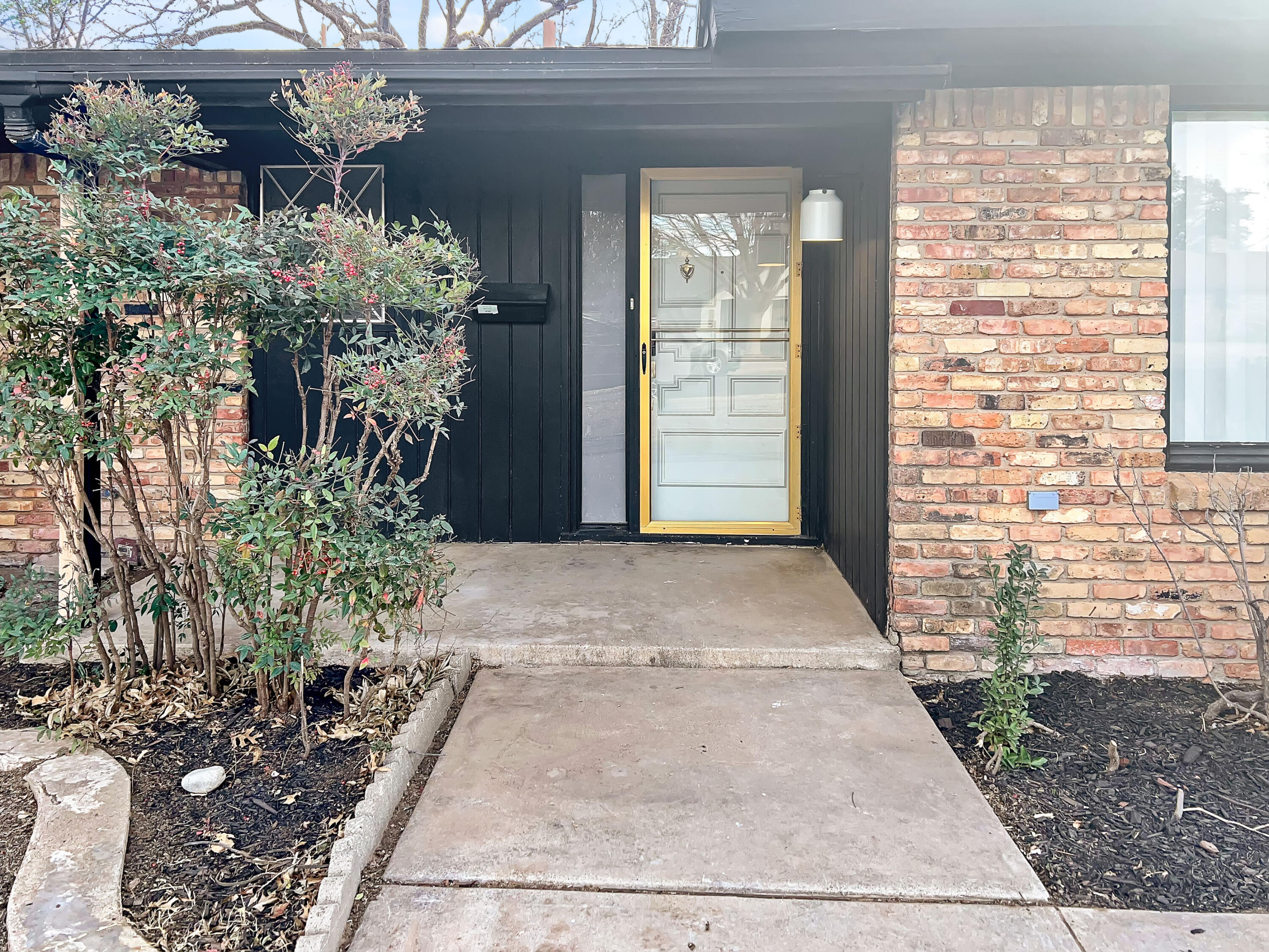 3827 52nd Street Lubbock, TX 79413 - Photo 2 of 24 a view of a entryway of the house
