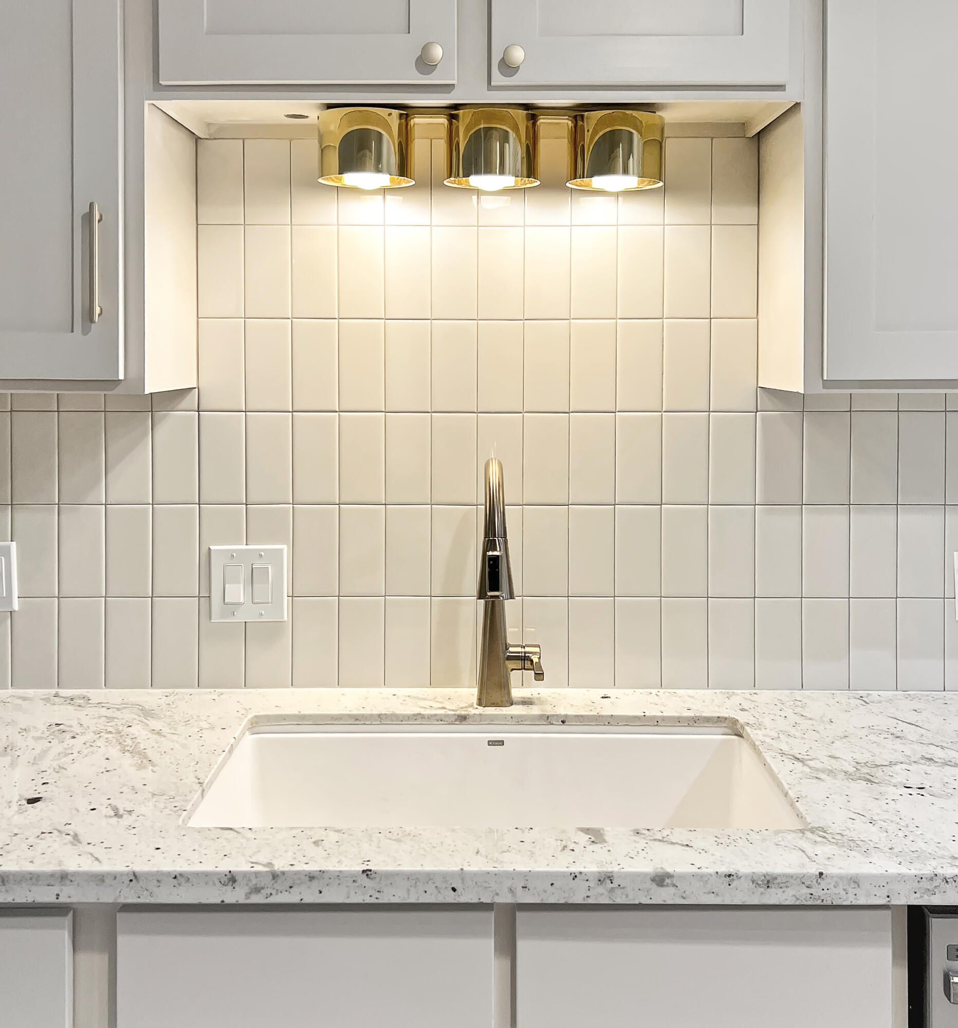 3827 52nd Street Lubbock, TX 79413 - Photo 23 of 24 a bathroom with a granite countertop bathtub and sink