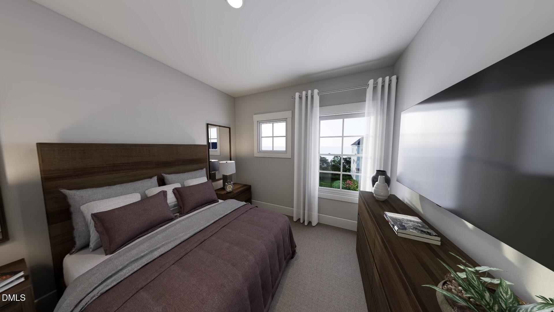 2401 Adrift Road Fuquay-Varina, NC 27526 - Photo 14 of 24 a bedroom with a bed and a tv