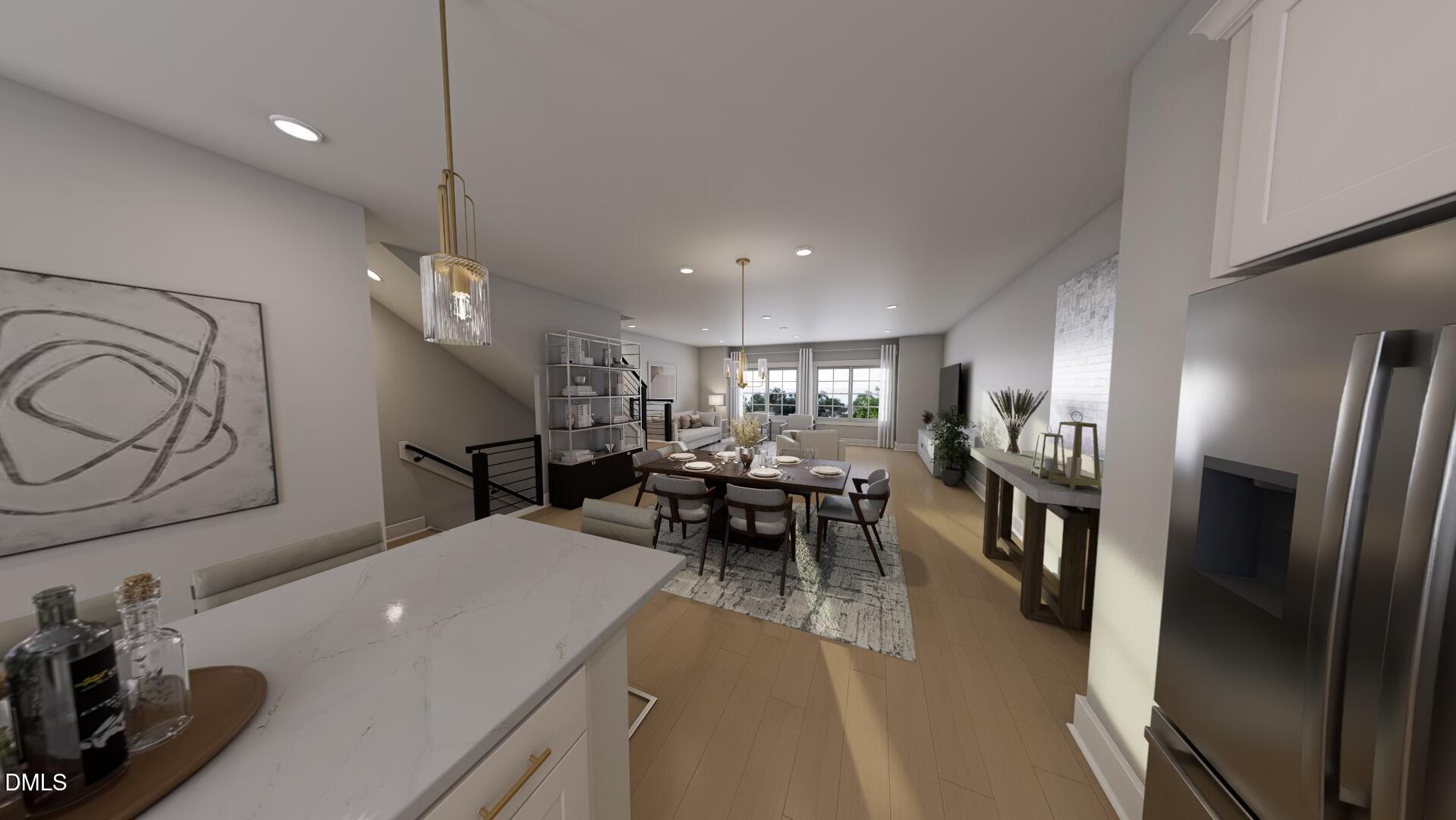 2401 Adrift Road Fuquay-Varina, NC 27526 - Photo 4 of 24 a kitchen with lots of counter space and stainless steel appliances