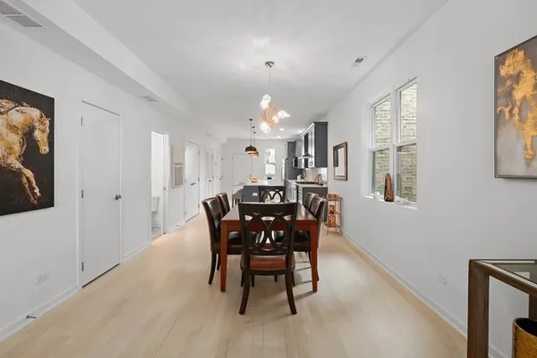 a view of a dining room with furniture