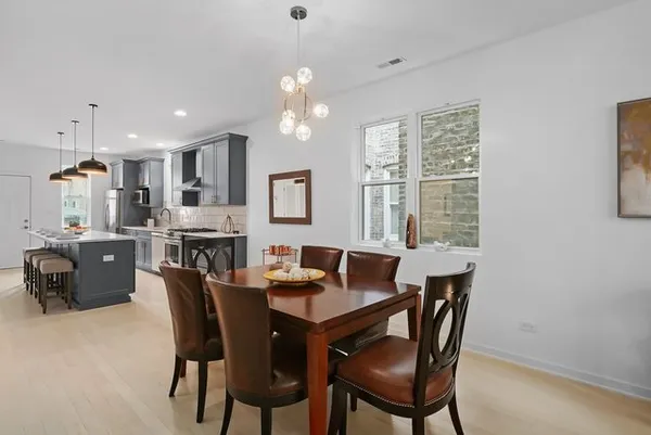 a view of a dining room with furniture