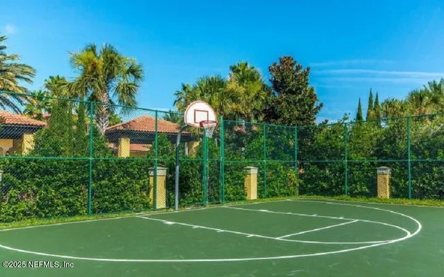 a view of an outdoor space and tennis court