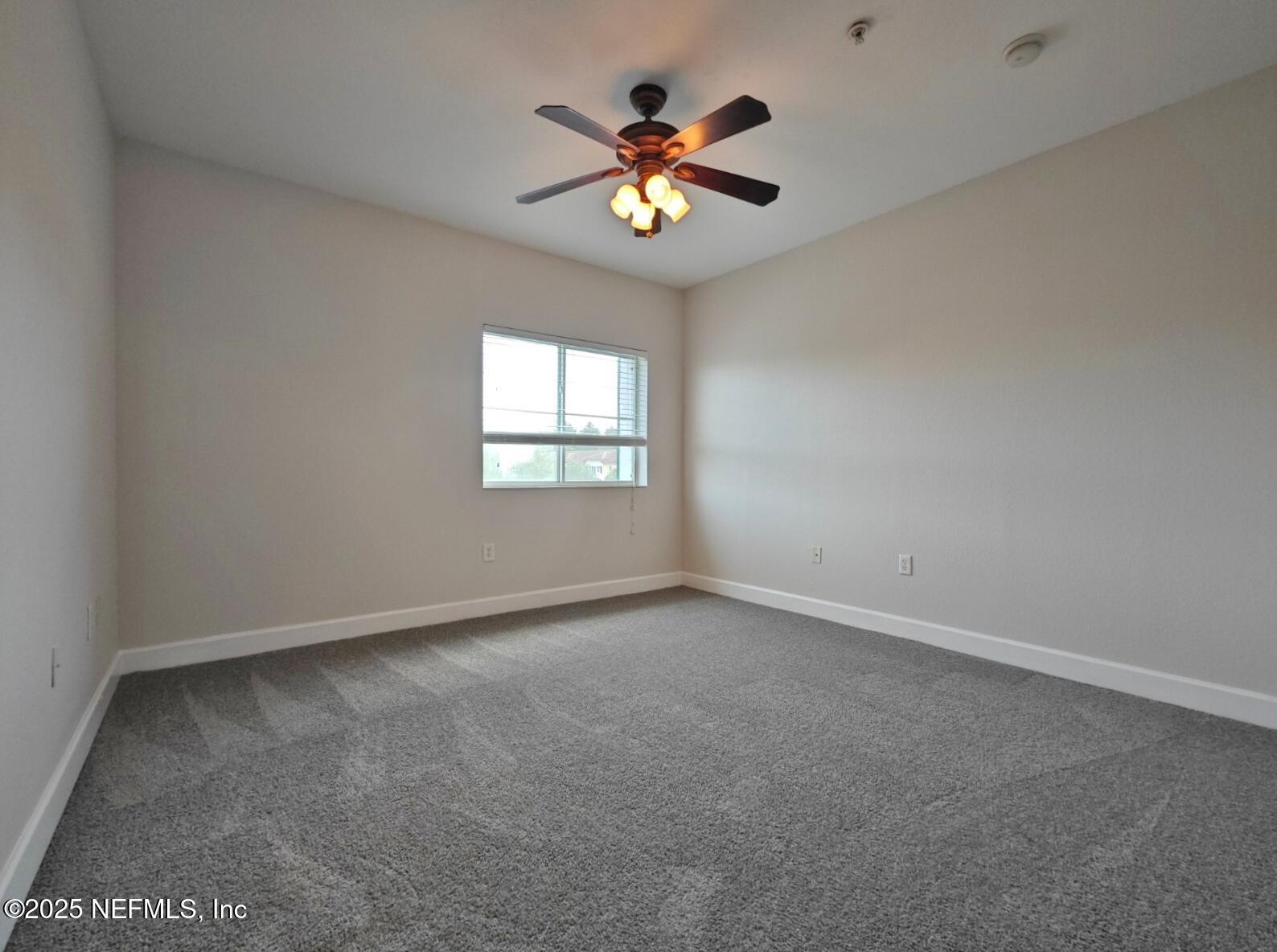 9745 Touchton Road, Unit 723 Jacksonville, FL 32246 - Photo 6 of 18 an empty room
